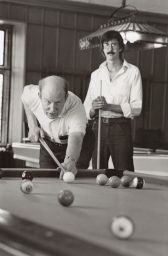 Archie Ammons shooting pool with student (?), David Finn