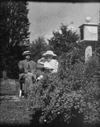 John Henry Comstock and Anna Botsford Comstock in their garden.