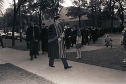 Faculty Marshal leading Commencement processional