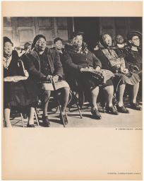 Portrait of women seated in a row