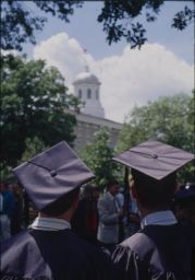 Two graduates gaze at Main Hall