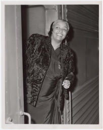 Ethel Waters standing out of train