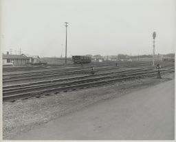 Ore Cars on Railroad Tracks on Approach to Viaduct