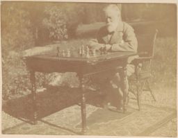 Willard Fiske playing chess