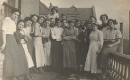 Women on Ormsby Hall back porch