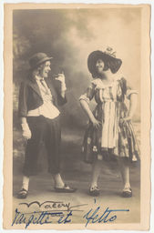 Male impersonator in bowler hat and woman in dress