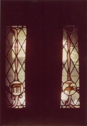 Two small stained glass windows in Olive Tjaden's home