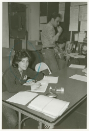 Woman working on paperwork in an office