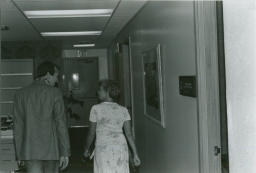 Brad Truax and Honolulu Councilwoman Marilyn Bornhorst walking down a hallway