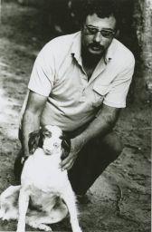 Economics professor Corry Azzi with a dog