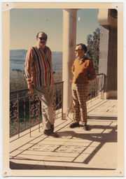 William Stringfellow and Anthony Towne standing on balcony