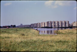 Large housing development from across a park area (The Hague, NL)