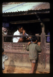 barandama basi tambakhu tandai (बरण्डामा बसी तमव्खु तान्दै / Smoking Tobbaco Sitting in porch)