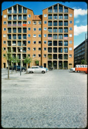 Parking area in front of a large apartment building (Christians Garden, Copenhagen, DK)