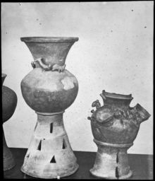 Two ceramic artifacts, possibly jars, from burial, undated