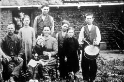 Family Posing for a Picture - Boy with a Drum