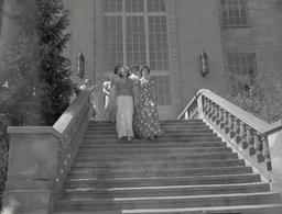 Women coming down stairs