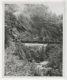 Tweetsie locomotive and cars on ET&WNC through the Appalachian Mountains and Doe River Gorge