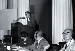 Don E. Eyles, speaking at a lectern. Photograph.