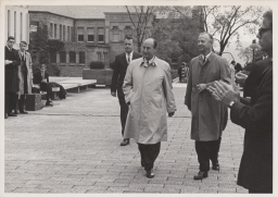 Cornell president James A. Perkins (right) and Adlai Ewing Stevenson II on Olin Library terrace at Centennial celebration