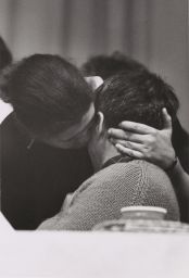 Daniel Berrigan, woman embracing him