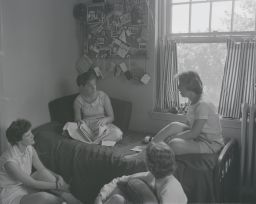 Four students in Sage Hall room