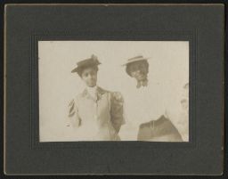Portrait of two women wearing hats