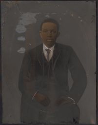 Portrait of a young man wearing a suit