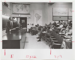 Frank H. T. Rhodes in classroom lecturing to students