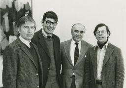 Group photograph of four faculty members