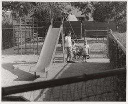 Children on a playground in Baldwin Hills Village.