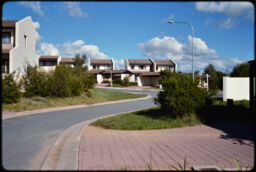 Townhomes along a road (Belconnen, Canberra, AU)