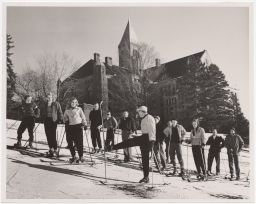 Students wearing skiis in front of Uris hall