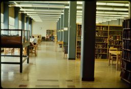 View of 2nd floor stacks when it housed books and allowed smoking