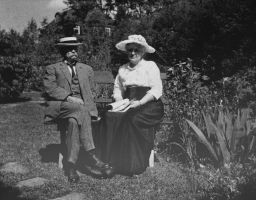 John Henry Comstock and Anna Botsford Comstock in their garden.