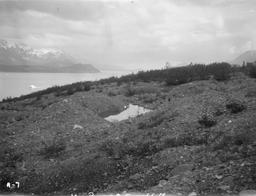 Moraine on gravel terrace, west side of Russell fiord. Also march of vegetation. Also gravels on east side of valley