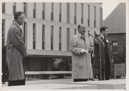 Cornell president James A. Perkins (left) and Adlai Ewing Stevenson II on Olin Library terrace at Centennial celebration