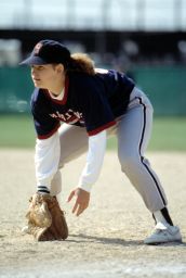 Softball, woman fielding the ball