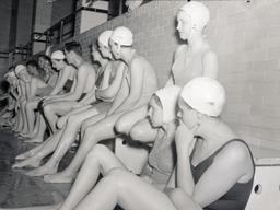 Swimmers lined up at pool at Alexander Gym II