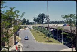Shopping complex exterior, access road, and double deck parking (Columbia, Maryland, USA)