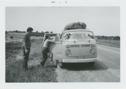 Students with Volkswagen van with broken windshield on the Slavic trip
