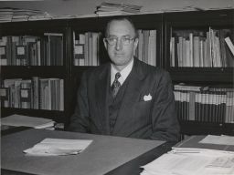 Paul G. Oppermann at his desk