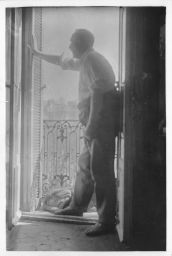 Ford Madox Ford on balcony