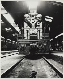 CNW Locomotive #1653 at platform in passenger terminal