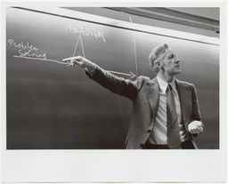 Frank H. T. Rhodes by chalkboard
