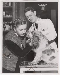 Edward Neserke(?), wife Leona, and Freckles the dog