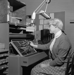 Mrs. Norma Merritt Wires Control Panel for Printing