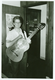 National Gay Task Force staff member with acoustic guitar