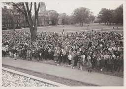 Crowd in the Cornell arts quad facing the terrace at Olin Library at Centennial celebration