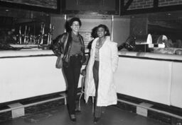 Two unidentified women at Harlem World